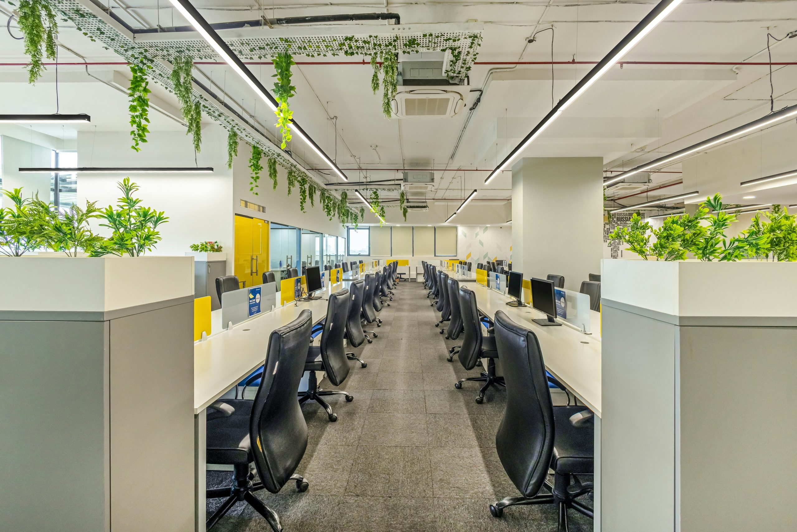 Before and after comparison of GreenTech Solutions' facility improvements