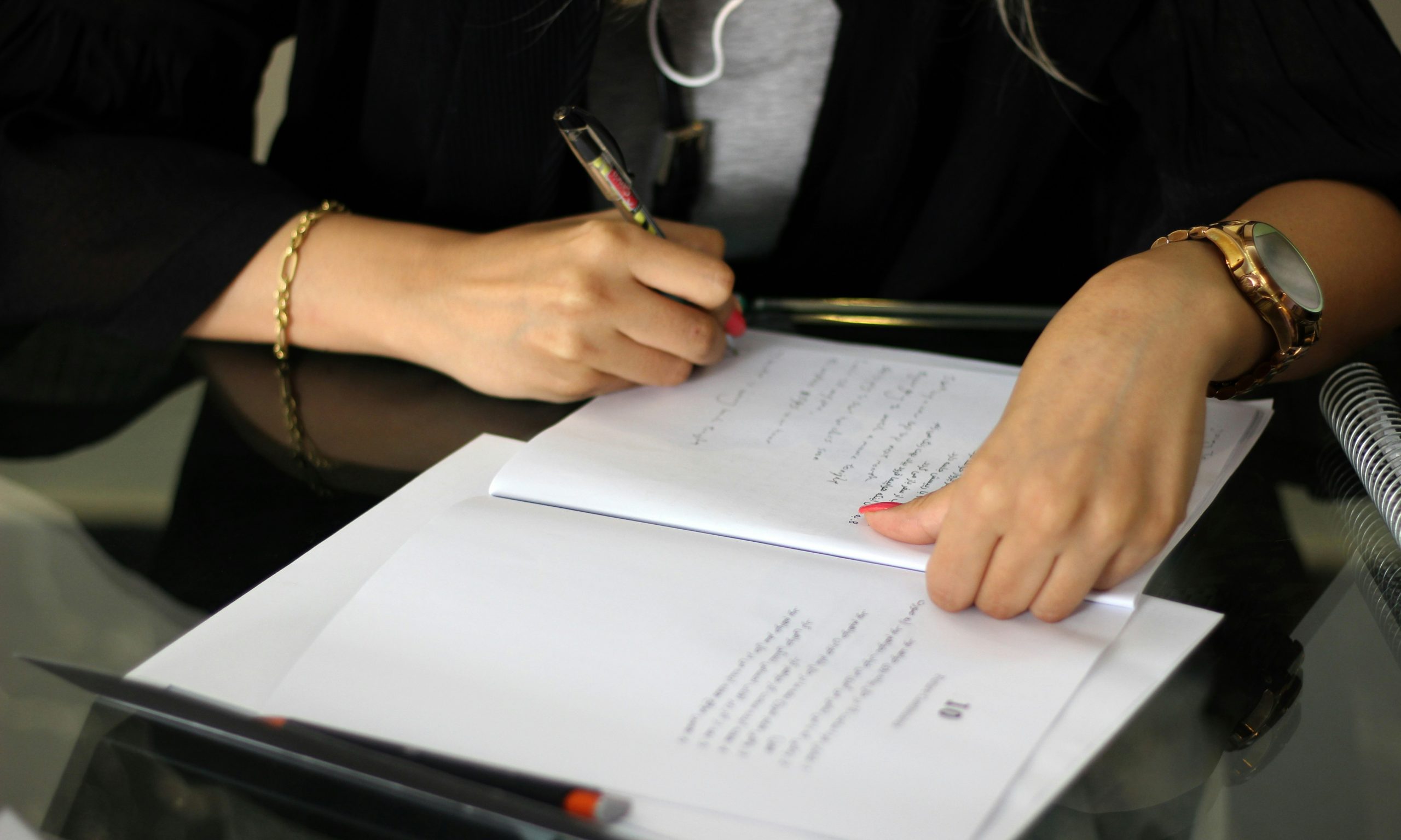 Person organizing documents for claim preparation