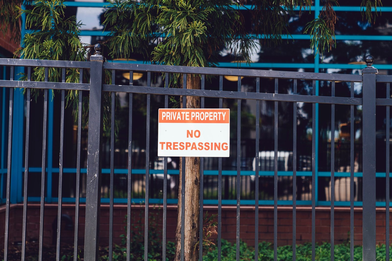 Photo of a mediator seated between two parties discussing at a table