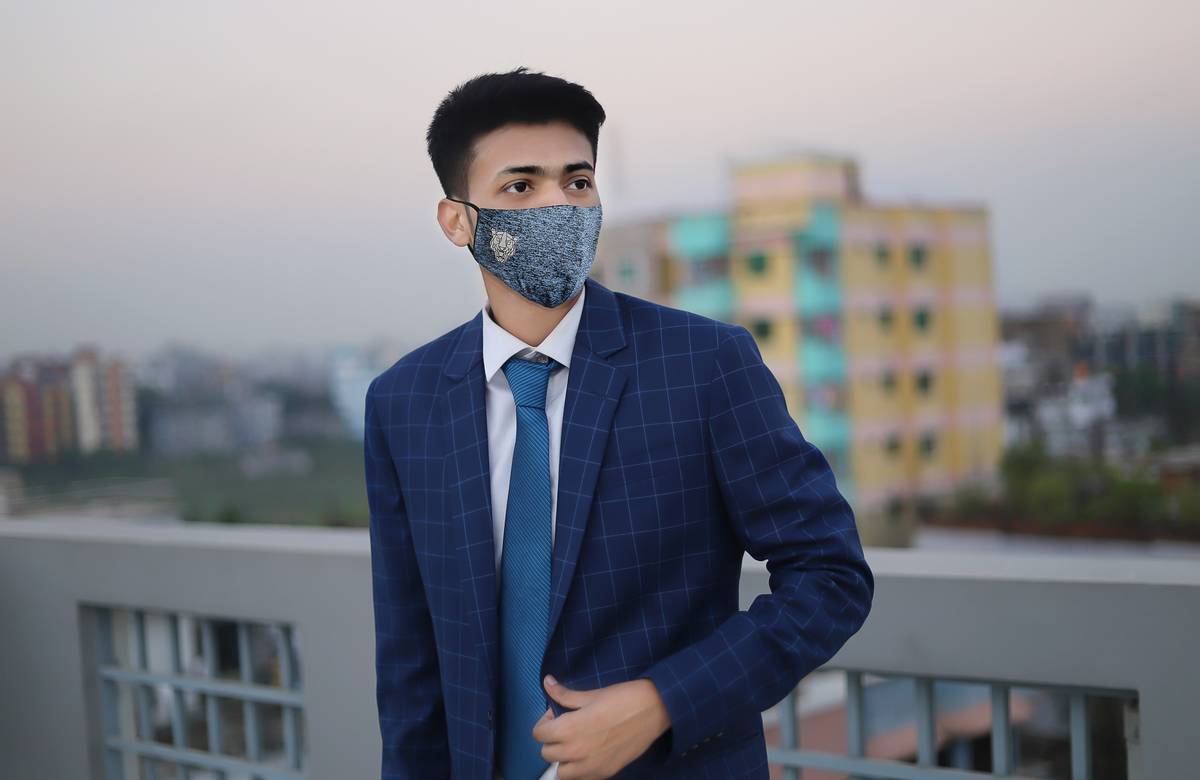 Before-and-after photos of Factory X showing reduced pollution levels.